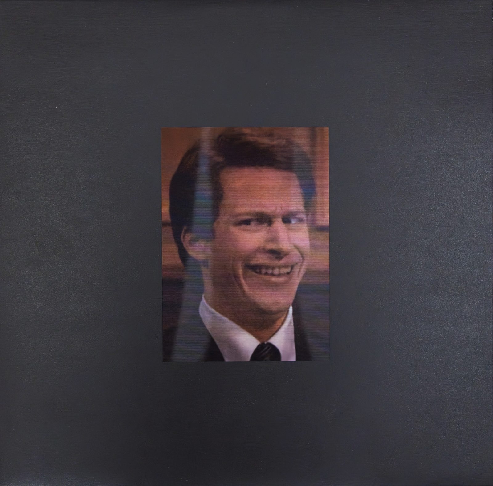 Plattencover von Starke Raucher — Debilest Hits: ein grinsendes Portrait auf schwarzem Grund.
